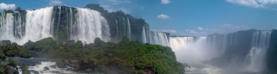 The Iguazu Falls with their mesmerizing curtain of water present an enchanting sight that lingers in the memory