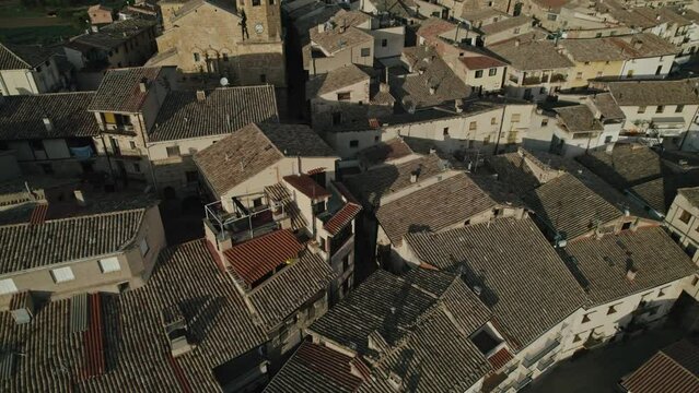 Aerial view of rooftops the small town of Beceite surrounded by mountains, Teruel, Matarranya comarca, Spain.