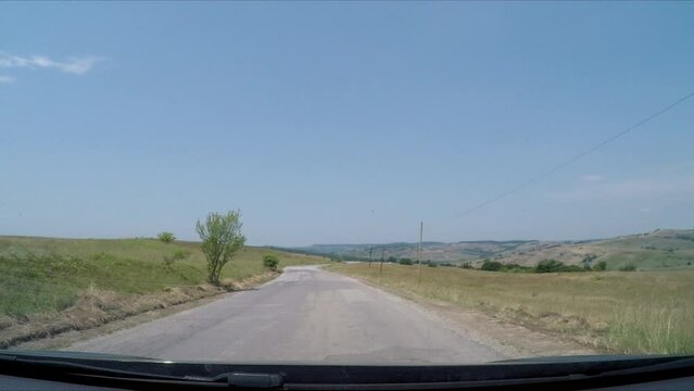 Driving through the landscape of Viscri in Romania
