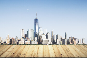 Wooden tabletop with beautiful Manhattan buildings on background, mock up