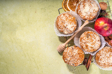 Apple pie crumble streusel muffins, Sweet autumn baking pastry with red apple slices, cinnamon and spices and crumble toppings