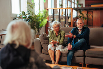 Senior couple talking on couples therapy