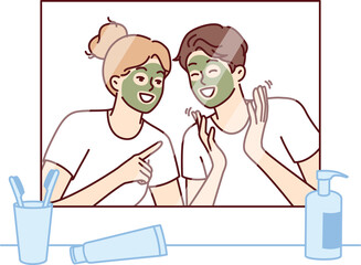 Cheerful couple with rejuvenating mask on faces look in mirror and laugh enjoying joint vacation