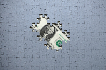 Missing puzzle pieces on the background of money, hidden assets, tax amnesty, american dollar...