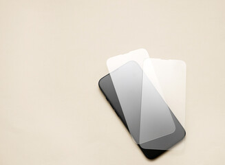 glass film change,repair and maintenance smartphone.hand in glove holding screen protection.flying in air tempered glass and phone.medical stethoscope meaning mobile doctor.tools and display napkin