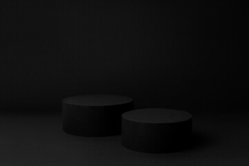 Abstract black stage with two round podiums mockup for presentation cosmetic products, goods,...