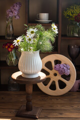 Bouquet of flowers on a wooden background . Rustic style concept and flower shop