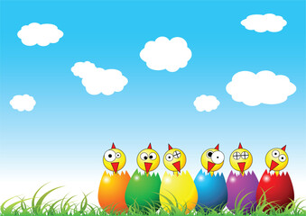 Obraz na płótnie Canvas Easter chicks and eggs on grass over cloudy blue sky