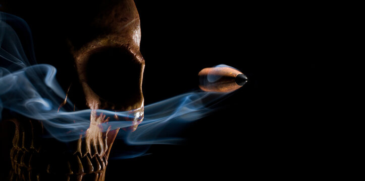 Violent skull with smoke and bullet