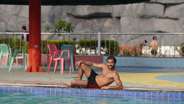 boy image during travel sitting near swimming pool holidays fun stock images