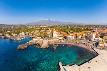Fototapeta na wymiar View of Stazzo old city, Catania, Sicily, Italy. Summer beach and sea