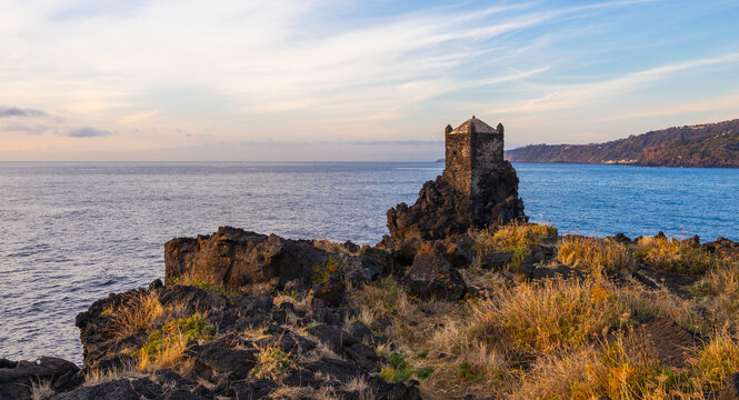 Torre Saracena old tower, Santa Tecla, Catania, Sicily. Sea and rocks