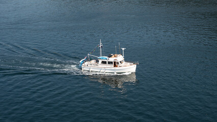 yacht boat in water. one yacht boat white color. yacht boat for summer trip. photo of yacht boat