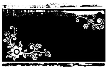 White floral pattern  on a grunge black background.