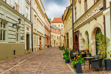 Naklejka na ściany i meble Street view in old town Krakow, Poland, Europe. Famous tourist place