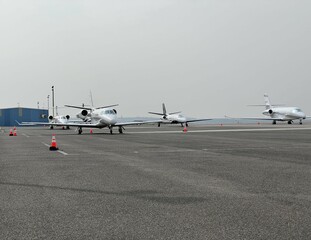 sleek and elegant private jets on the airfield