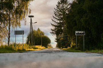 From the frog's perspective;  the view of the asphalt road in front of the built-up area