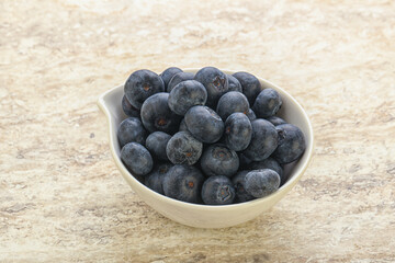 Sweet ripe blueberry heap in the bowl