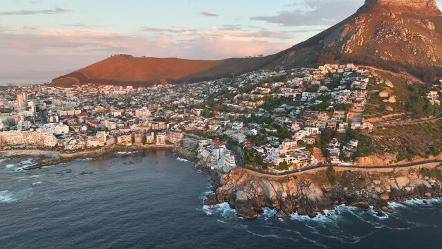 Aerial view of Atlantic Seaboard sunset with Lion&rsquo;s Head Mountain, Bantry Bay and Sea Point from Atlantic Ocean, Cape Town, South Africa.