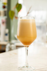 cold cappuccino coffee served in a white bar