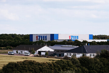 Obraz premium Germany, Europe - 05 23 2023: The headquarters of the provider of logistic services based in Germany.