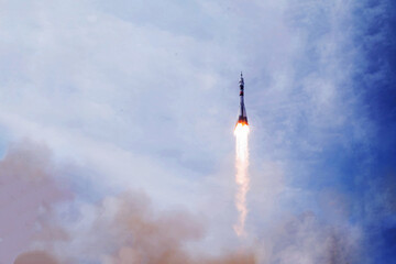 Rocket launch into space. Elements of this image furnished NASA.