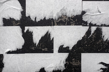Scraps of advertising posters close-up.