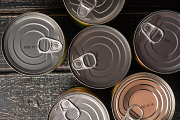 Tin cans with printed expiration date.