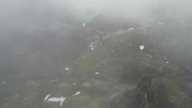 Aerial view of highlands landscape with low clouds on the mountains in Iceland.