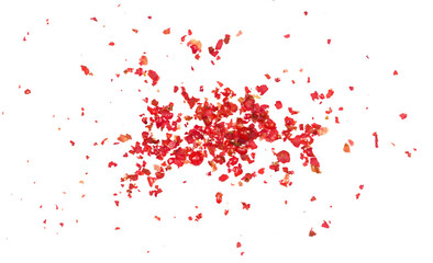 Ground red peppercorns, crushed pepper pile isolated on white background and texture, top view