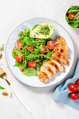 Grilled Chicken Fillet with Fresh Salad, Cherry Tomatoes and Avocado, Healthy food, Keto, Paleo Diet Menu