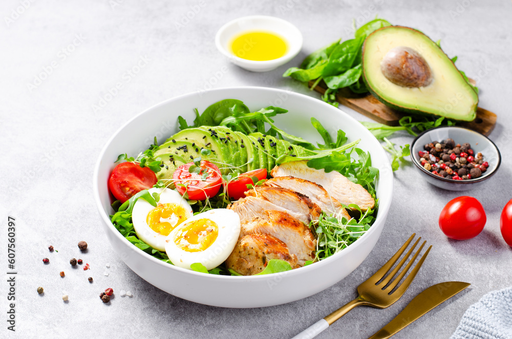 Wall mural grilled chicken fillet with fresh salad, cherry tomatoes, boiled egg and avocado, budha bowl, keto p