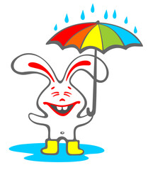 Happy rabbit with a umbrella isolated on a white background.