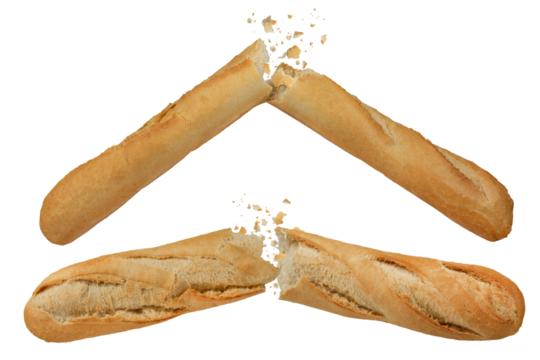 A set of several loaves of long white bread isolated on a white background. A loaf of crispy baguette broken in half, crumbs flying in different directions. To be inserted into a design or project.