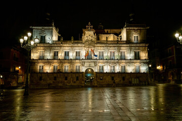 Fototapeta na wymiar Stone building with beautiful old facade at Plaza Mayor in Leon at night, Spain