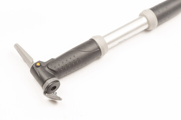 Aluminum bicycle pump isolated above white background with copy space