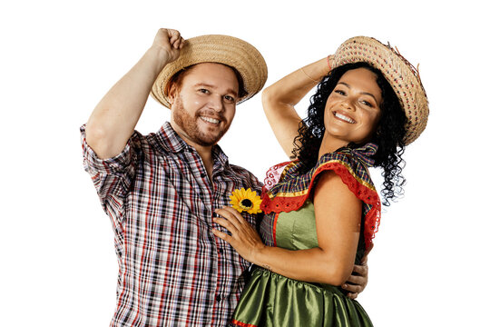 Brazilian couple wearing traditional clothes for Festa Junina - June festival - dancing over white background