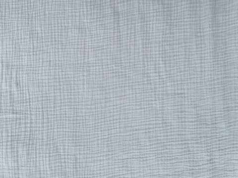 Muslin cloth texture background in grey tones. Muslin cotton fabric 