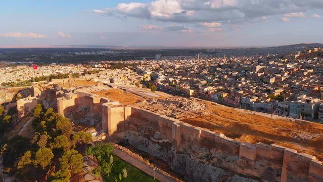 Cinematic drone panning view ancient urfa castle walls in historical city of Sanliurfa. Turkey famous historical landmark