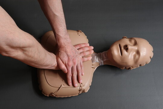 CPR or cardiopulmonary resuscitation practice on a doll. 