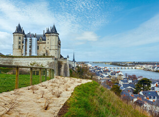 View of the Saumur castle on the banks of the Loire River, France. Constructed in the 10th century, was rebuilt in the later12th century.