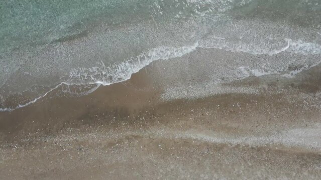 Aerial view of an empty beach along the Thracian Sea, Makri, East Macedonia and Thrace, Greece.