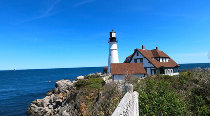 Fototapeta na wymiar Portland Head Lighthouse near Portland, Maine on sunny day