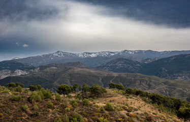 Clouds over the mountains of Sierra Nevada in Andalucia Spain