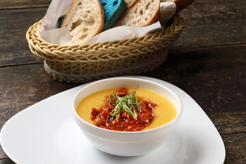 Polenta with sausage ragout in bowl