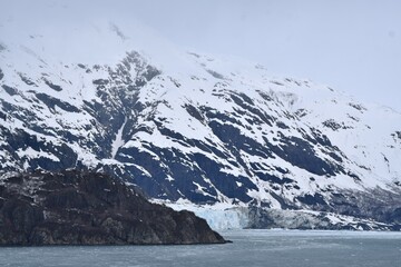 Snow covered cliffs in Glacier Bay Alaska