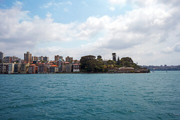 View of Admiralty house and Kirribilli from the ferry, a harbourside suburb on the Lower North Shore of Sydney Harbour.