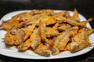 Fried Lambari do Rabo Vermelho (Astyanax bimaculatus) typical Brazilian freshwater fish