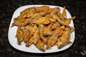 Fried Lambari do Rabo Vermelho (Astyanax bimaculatus) typical Brazilian freshwater fish