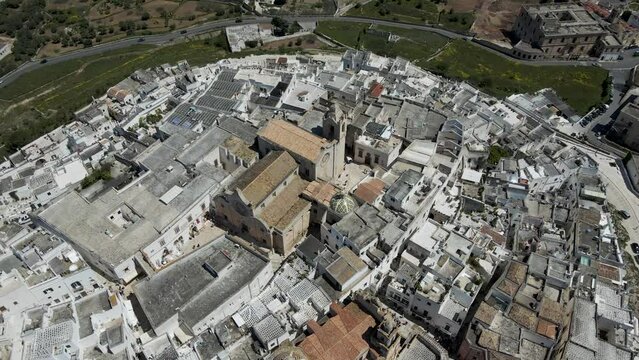 Aerial view of Ostuni old town and the cathedral, the white town near Brindisi, Puglia, Italy.
